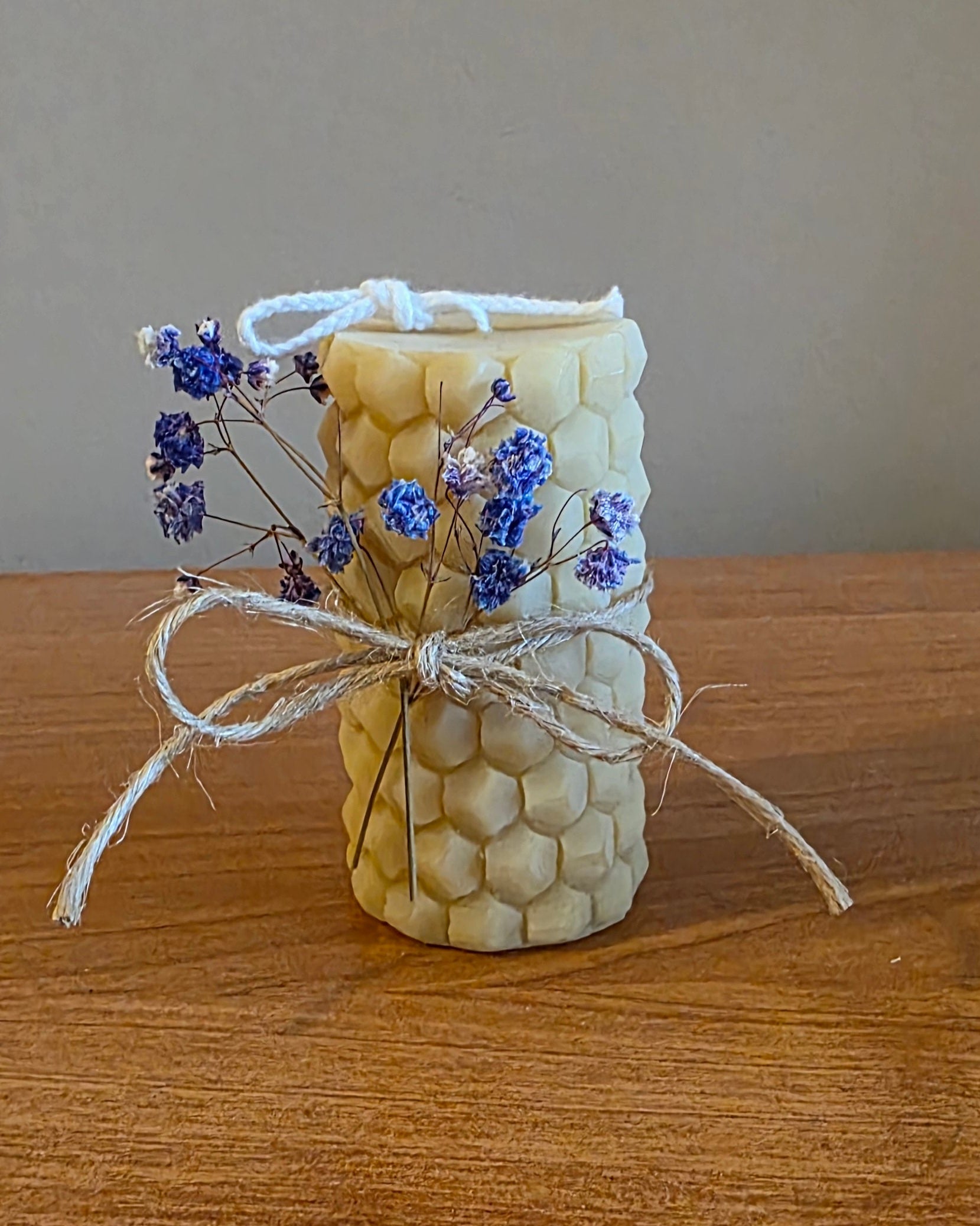 Beeswax pillar candle with blue flowers
